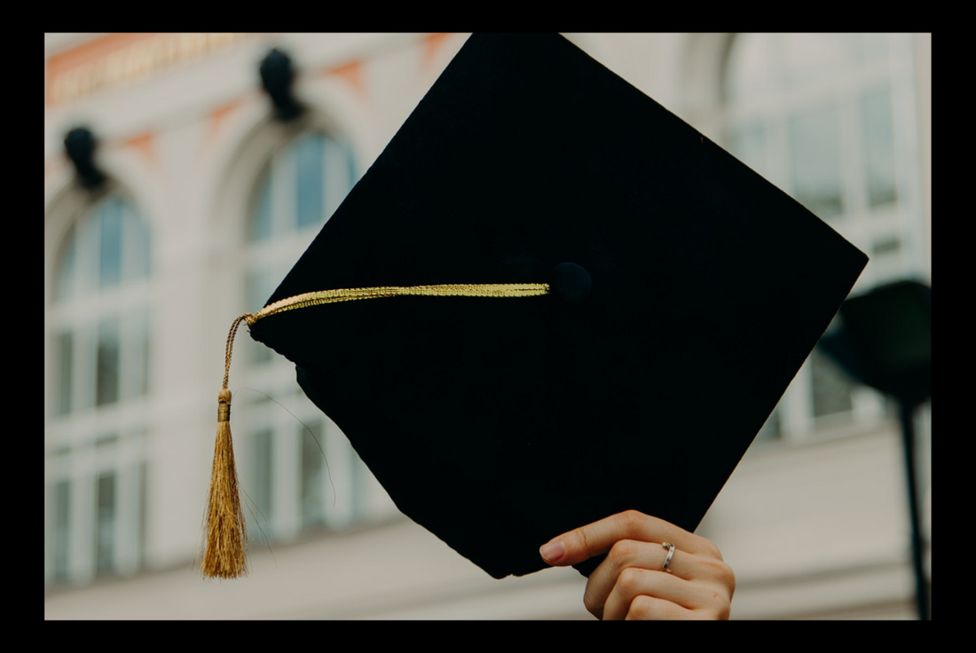 Student holding a graduation cap