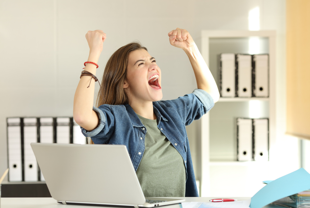 woman celebrating her good GRE score