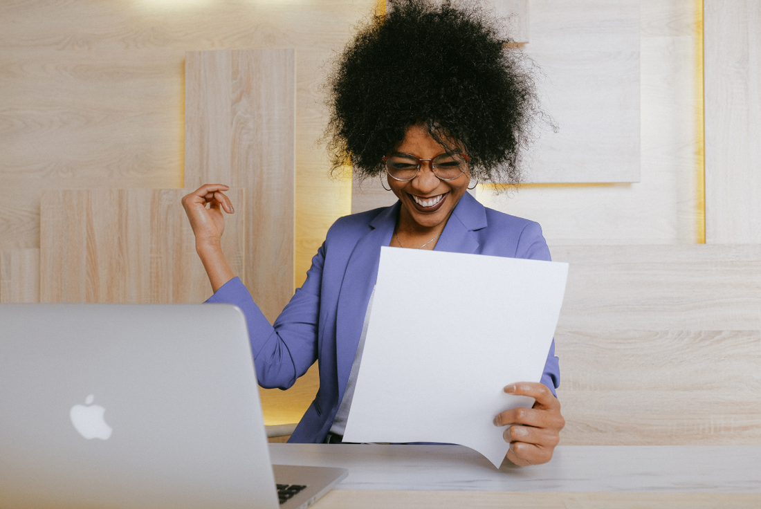 woman celebrating her good LSAT score