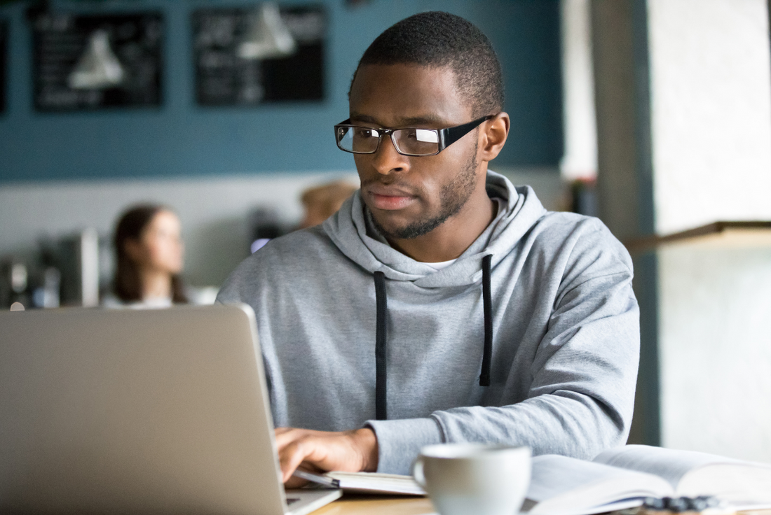 young man studying MCAT practice questions